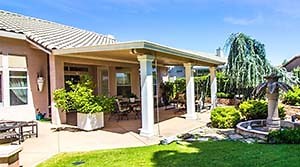 8 Ways to Enclose a Patio (With Examples) - Backyard Patios and Decks