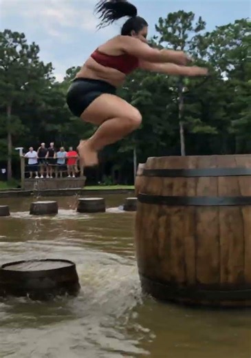She Jumped Across Barrels That Kept Getting Bigger Over Crocodiles 🐊 #CrocodileChallenge#BarrelJump