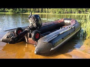 Inflatable boat launching into the lake using launch wheels