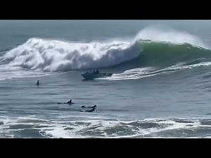 Boat capsizes in waves at Steamer Lane in Santa Cruz