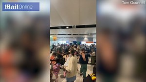 Travellers face winding queues to pass through border control at Heathrow airport