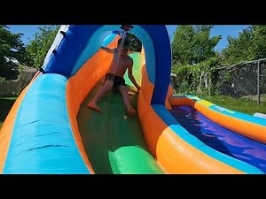 Summer Fun with a Huge Inflatable Waterslide and Pool!