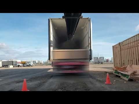 Loading Grain into Container - On Jobsite