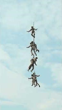 Watch Marines get tied to a rope and hauled through the air by helicopter for extraction training