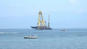 The recovered Bayesian superyacht takes its final journey to a Sicilian port