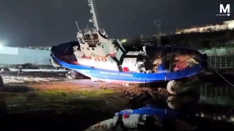 Terrifying moment Coast Guard vessel capsizes during maintenance work