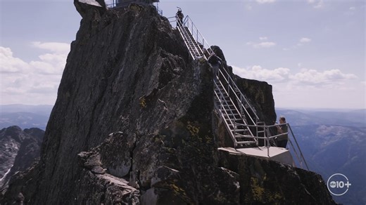 The Sierra Buttes Fire Lookout in Tahoe National Forest blends outdoor adventure with history. Built in 1915 and redesigned in 1963 with its now-famous 180 aluminum steps, the tower rises 8,587 feet above sea level. Visitors can reach it by hiking or jeeping to the base, then climbing the steps for panoramic views of the Sierra Nevada. Retired engineer Rich Eacobacci, who designed the stairs at age 26, still makes the climb at 88, sharing his lifelong connection to the tower with family. For hik