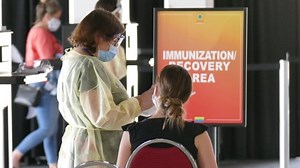 Manitoba launching temporary secure immunization card