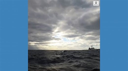 Man rescued after 22 hours on capsized boat