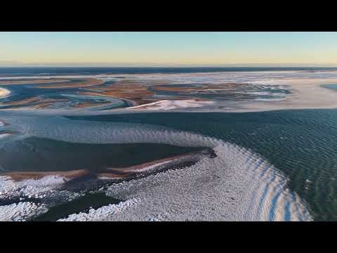 Slush waves on Nantucket Sound, Aerial at Chatham, Cape Cod : stock footage