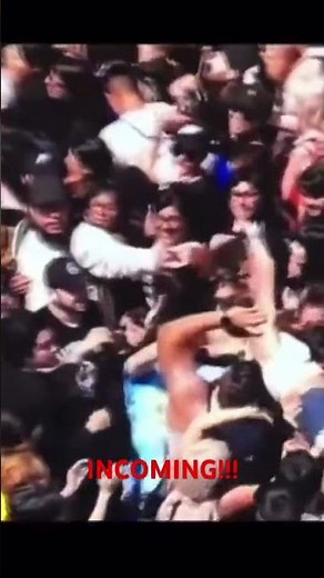 Fearless girl's shocking crowd surfing fail