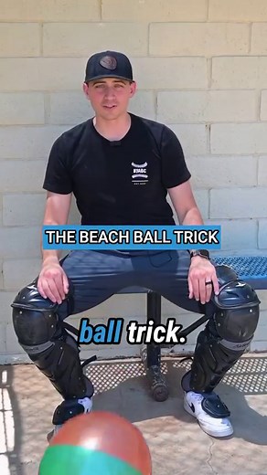 Use the beach ball trick👉🏼 This is why catchers turn around on pop ups 😵‍💫 The pattern of the baseball is the same as the beach ball 👀 It curves back to the pitchers mound So send this to your catchers so they dont drop your pop ups 💯 | Catching Made Simple