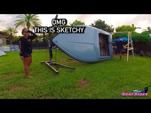 Lifting boat off the trailer and flipping it upside down