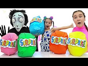 Ruby and Bonnie pretend play with chocolate surprises