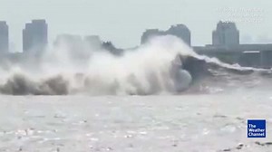 Incredible footage captures tidal wave phenomenon on river