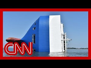 4 missing on capsized cargo ship