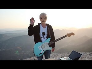 An alien playing Guitar (GRAViiTY - Rising Sun)