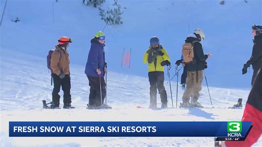 Skiers celebrate new snowfall at Palisades Tahoe