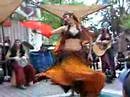 Gypsy-style Woman dances and twirls