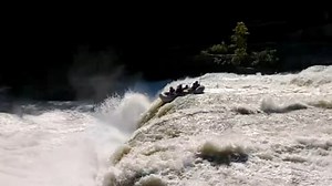 Video shows raft plummet over waterfall, throwing people overboard