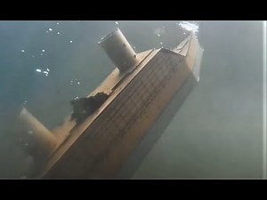 Cardboard ship sinking to the bottom of Lake Cardboardia