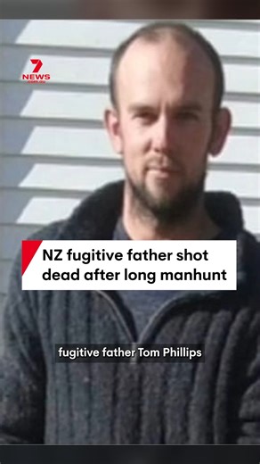 New Zealand fugitive Tom Phillips has been shot dead in a shootout with police in the Waikato region on the North Island. It ends a manhunt that began in 2021 after the father disappeared into remote bushland with his three children. One of the children has been taken into police custody and a search is underway for their two siblings. #tomphillips #waikato #nz #newzealand #police | 7NEWS Sydney