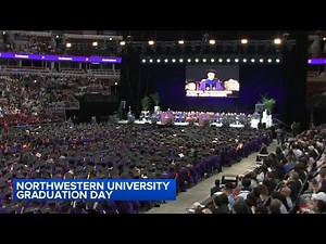 Several Northwestern graduates walk out of United Center during commencement