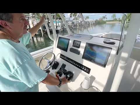 How to dock a twin engine boat in a boat lift (Almost a close call!)
