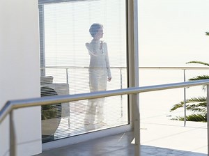 How to Enclose a Balcony With Glass | Homesteady