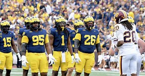 USCFootball.com staff picks against the spread for USC vs. Michigan