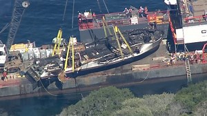 Charred remains of Conception dive boat are lifted off the ocean floor