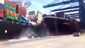 Containers go overboard when cargo ship crashes