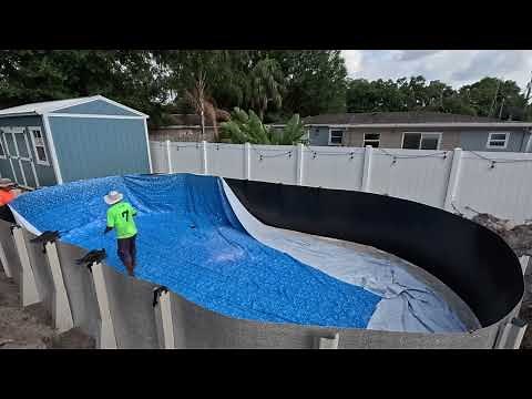 Pool Factory 15x30 oval above the ground semi in the ground pool install and updates