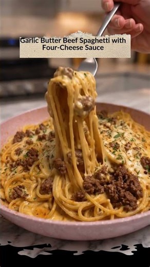 Garlic Butter Beef Spaghetti with Creamy Four-Cheese Sauce