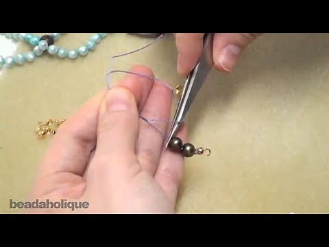 Pearl Knotting Using Tweezers