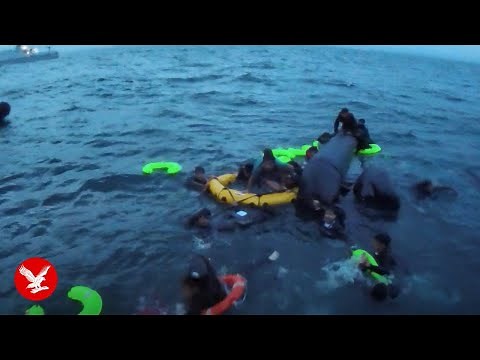 Migrants rescued from English Channel after dinghy capsizes