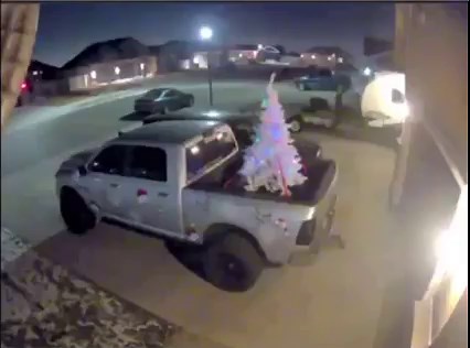 This is truly out of this world! A local family in Utah captured this INSANE footage on their secuirty camera. The family's "Christmas tree" turns into...something else. [Video Credit: @liftedram5.7 Instagram] | KSL NewsRadio