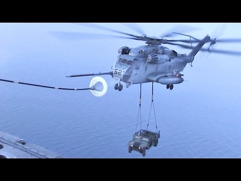 CH-53E Helicopter Perform Air Refueling While Carrying A Humvee
