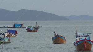 Vietnamese boats in a sea sunset. Blue hour. Nha Trang, Vietnam travel landscape and destinations.