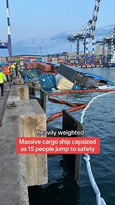 Massive cargo ship capsized as 15 people jump to safety | The Mirror