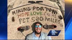 Student honors professor with scholarship walk