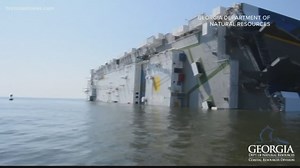 Crews using shipping containers filled with concrete to prevent erosion caused by Golden Ray