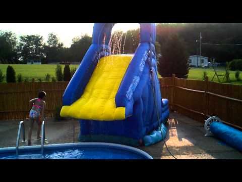 Crazy fun on the inflatable Banzai Blaster pool slide - in ground pool 8 ft
