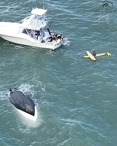 ‼️ ALERT: Boat Capsizes at Jupiter Inlet! ‼️ Witness the dramatic rescue as lifeguards and a passing vessel save the captain after a boat overturns in powerful northeast swells. Filmed today, September 15, 2025, around noon at Jupiter Inlet, FL. | Paul Dabill Photography