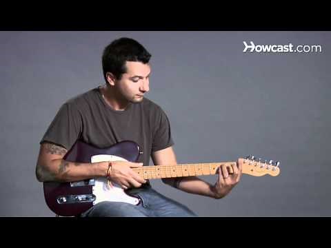 How to Play a D Minor Barre Chord | Guitar Lessons