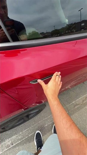 How do I open a Tesla door? 🤯 #tesla #automobile #cybertruck