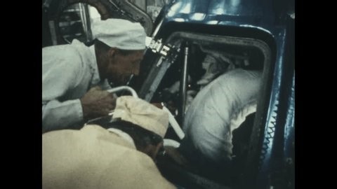 clip-4018665361-florida---1969-technician-inside-command-module