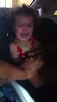 Baby scared shitless in drive thru carwash