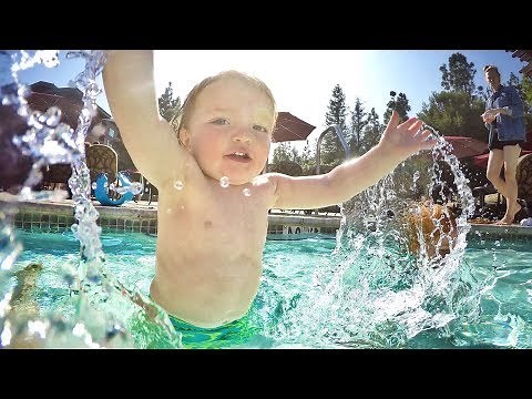 NiKO WATER SLIDE! Family Vacation Pool Day Swimming with Kids and... Time Travel??