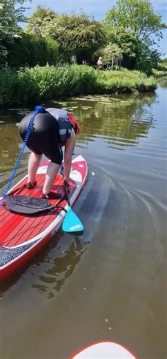 Woman Falls During Paddleboarding